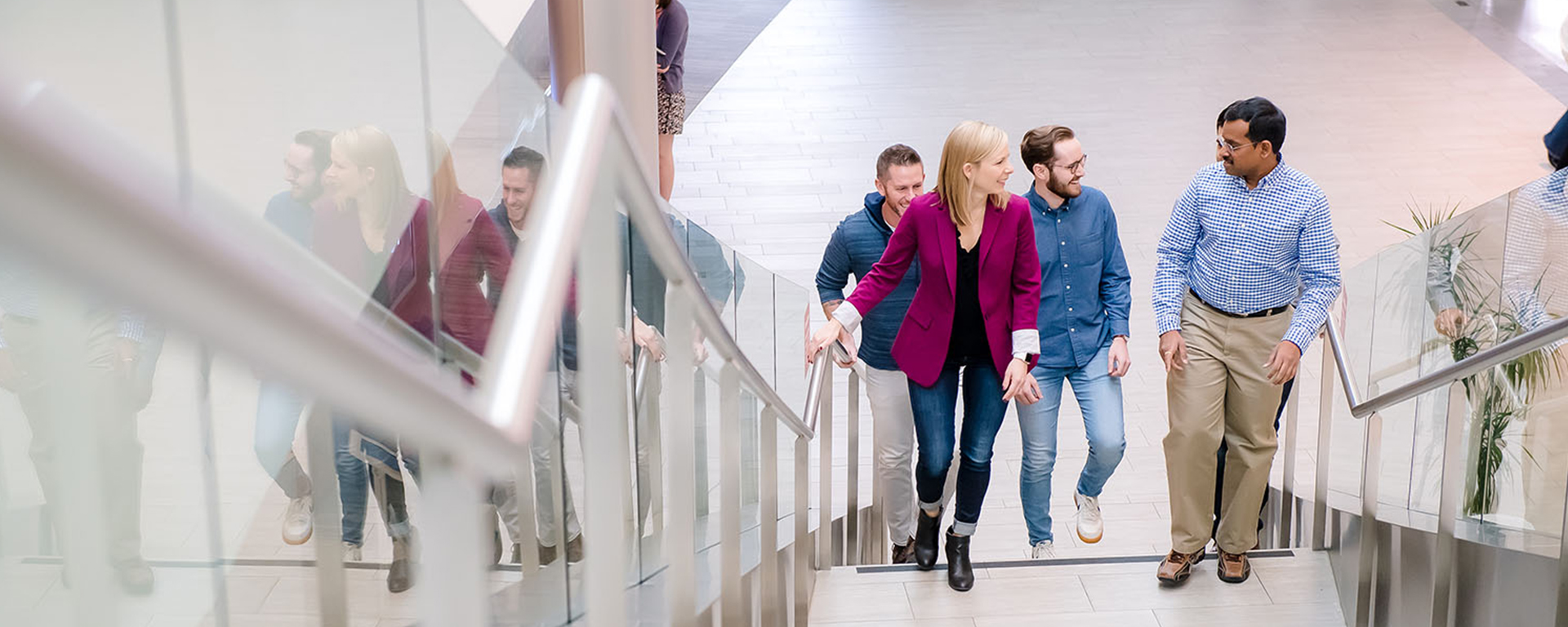 Capital One associates walking up the stairs