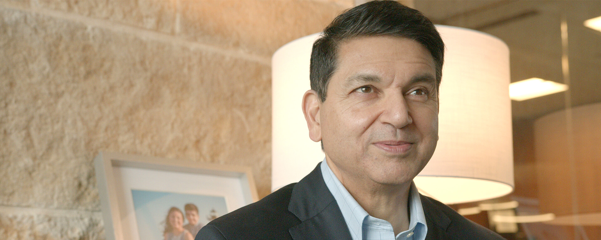 Sanjib Yajnik, President of Financial Services at Capital One, stands and talks about the lessons he's learned in life and leadership